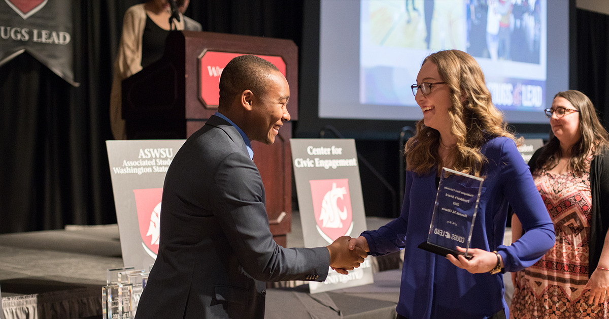 Student receiving a President's Award